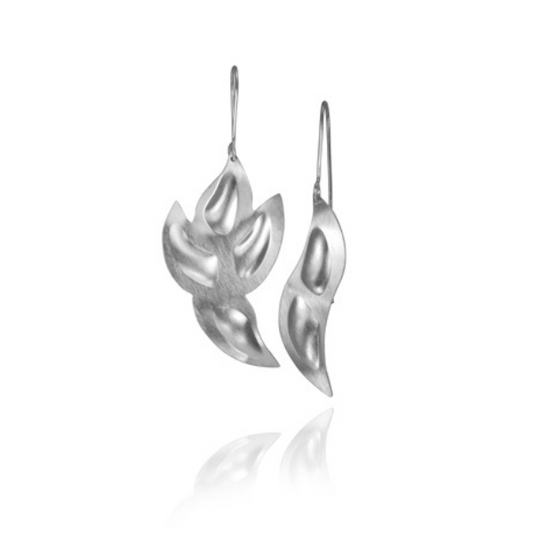 The Northern Light Series is inspired by the dance of the northern lights across the night sky and humanity's spiritual dance with "Self". The shapes represent a person dancing with the "One". The matt finish of the sterling silver piece and the whole shape captures the shimmering light of the northern lights. The pieces share an experience of spirit and aliveness.